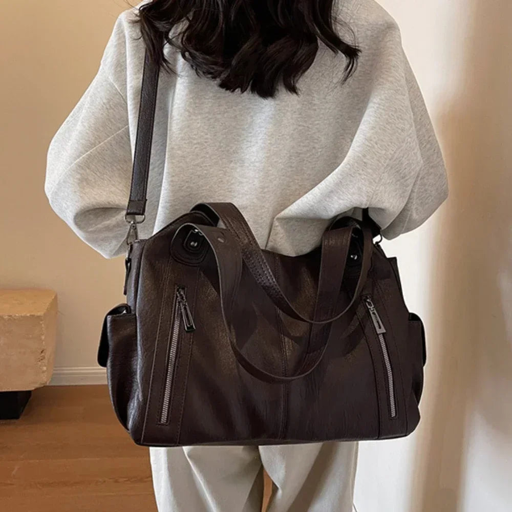 Bolso Alma chocolate llevado cruzado